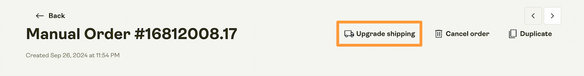 The upgrade shipping option can be located at the top of the page on the right side.