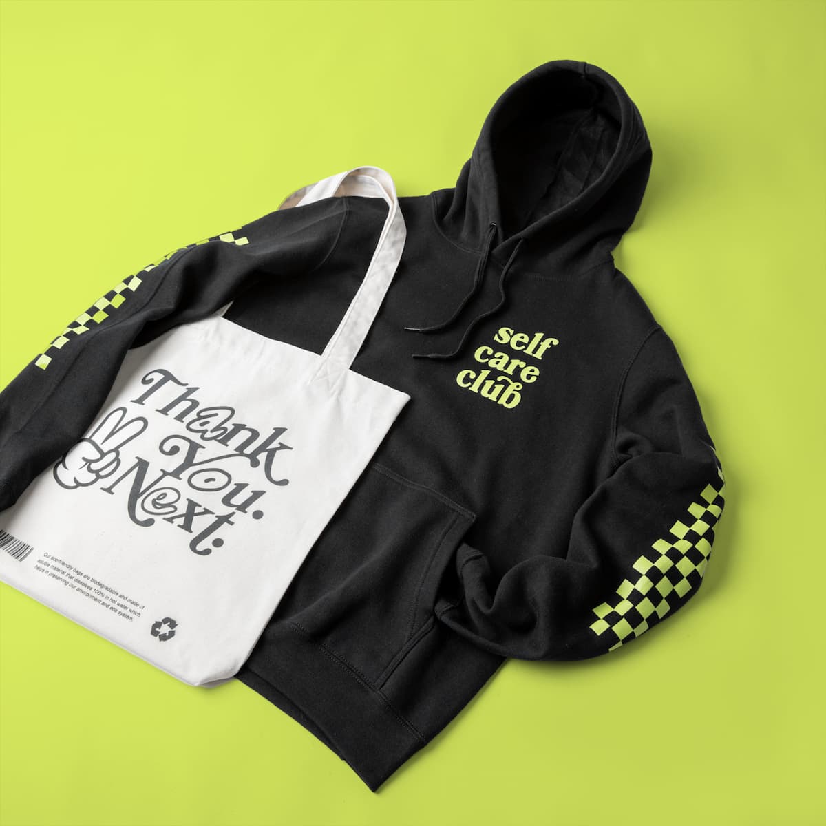 Sample image of a Printify hoodie and tote bag showing graphics design printed directly into the cotton fibers for a soft finish.