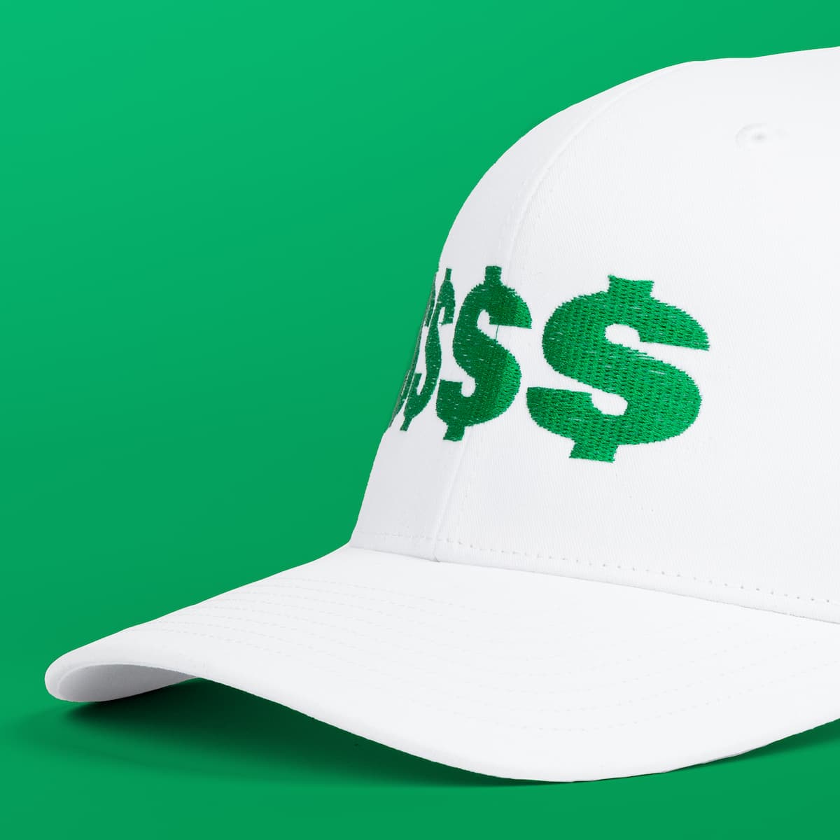 Close-up view of a classic dad-cap featuring a logo stitched with high-quality, reflective thread.
