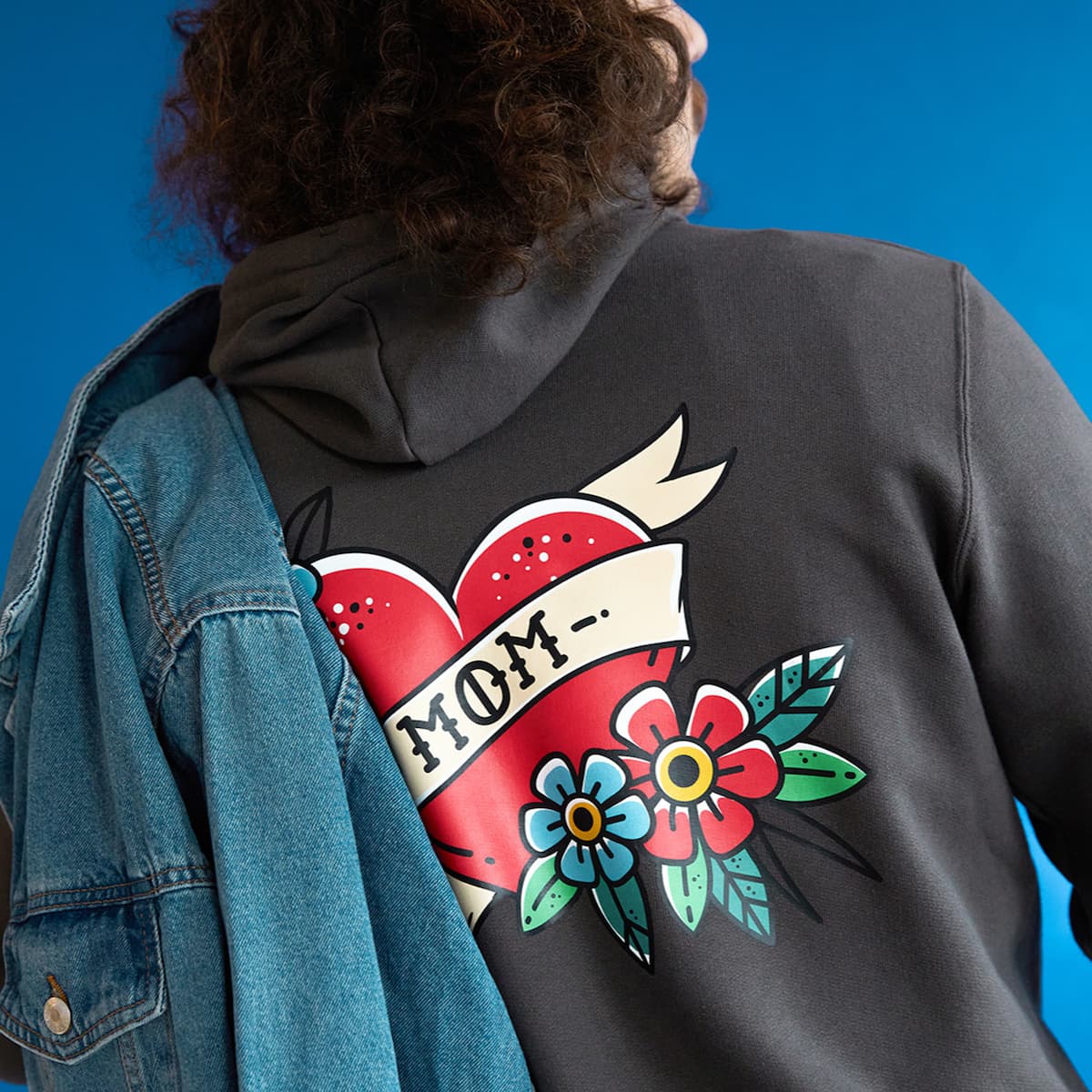 Close-up of a hoodie back print showing a vibrant design with crisp edges and saturated colors.